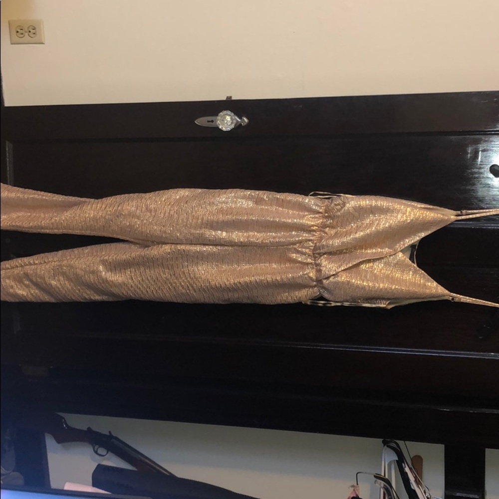 Gold shiny brand new jumpsuit from ASTR, size S